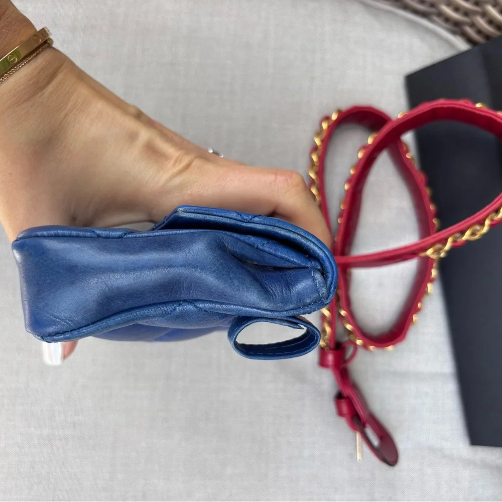CHANEL Blue Quilted Mini Bag with Red Strap